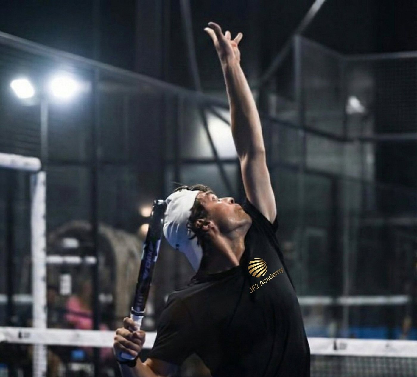 Padel player at the moment of serve